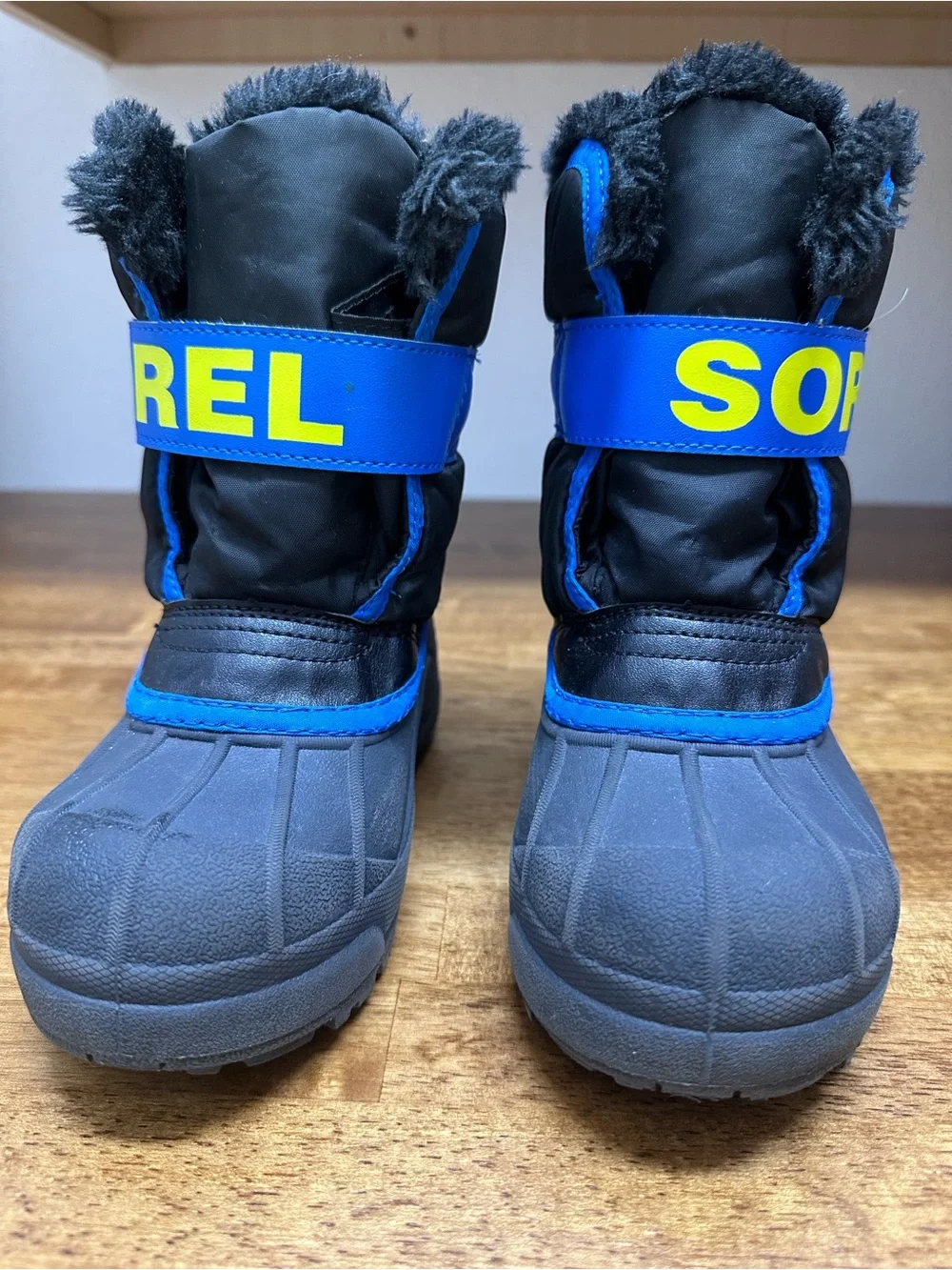 Sorel Kids Black and Blue Winter Boots with Yellow Logo